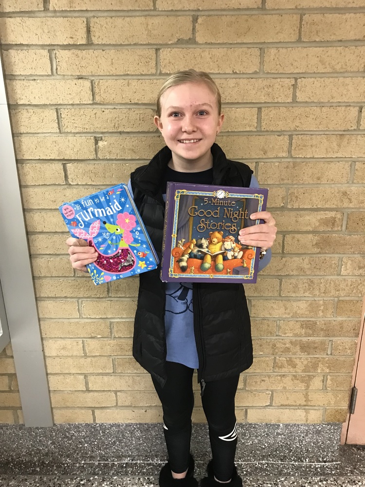 Student Holding Books